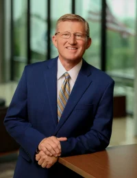 Professional headshot of Eric Groves.